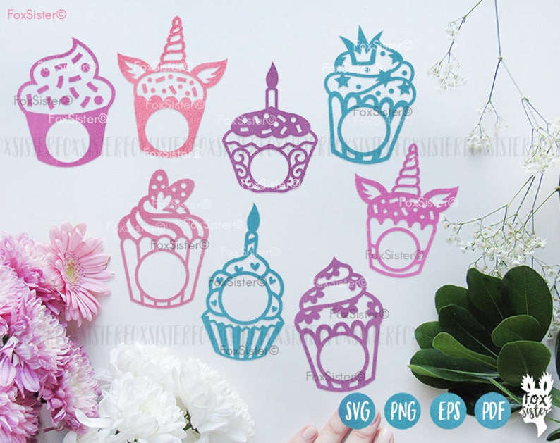 May include: A collection of colorful cupcake-shaped cutouts in pink, purple, and blue. Some designs include unicorn horns, bows, and candles. The image also includes the text "FoxSister" and file type icons for SVG, PNG, EPS, and PDF.