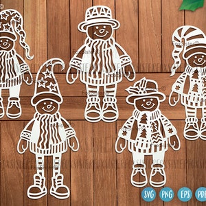 May include: Five white paper cut-out designs of snowmen wearing hats and sweaters with different patterns. The snowmen are standing on a woodgrain background.