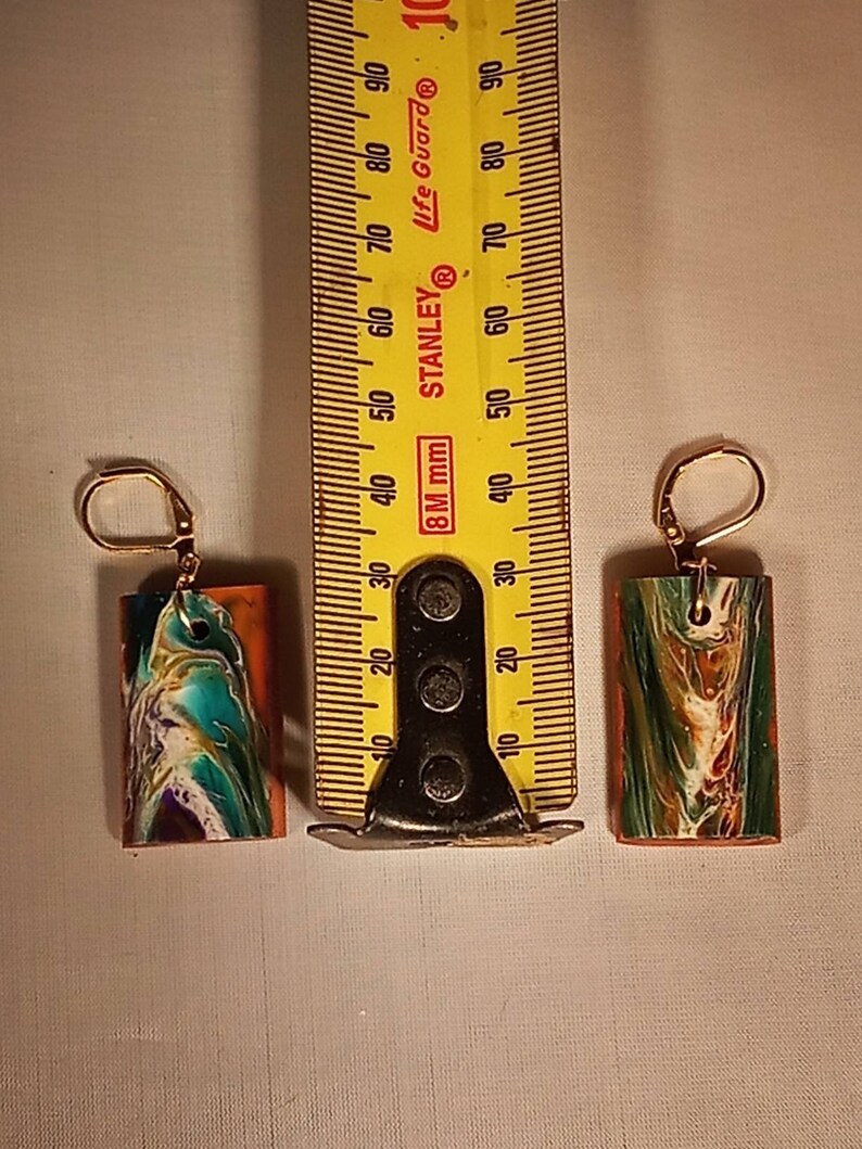 Earrings abstract resin design on cypress wood blocks which retain the scent of your favourite essential oil.