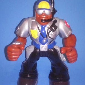 Boneco de ação do Rescue Heroes Jake Justice