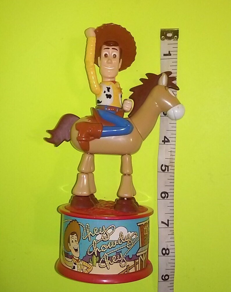 Toy Story 2 Mcds Woody Bulls Eye Candy Dispenser Etsy Toy story 2 mcds woody bulls eye candy dispenser etsy