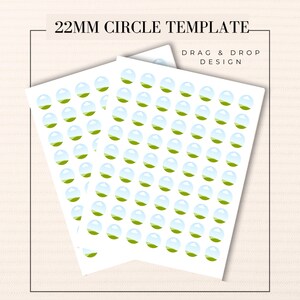 May include: A sheet of 22mm circle stickers with a design of a green field and a blue sky. The text "DRAG & DROP DESIGN" is printed on the sheet.
