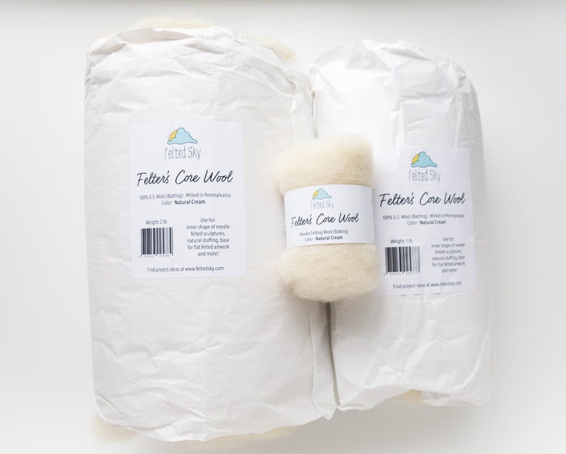 May include: Two packages of Felted Sky Felter's Core Wool in Natural Cream color. The larger package is 3 lb and the smaller package is 1 lb. The packages are made of white paper with a label that says "Felted Sky Felter's Core Wool 100% U.S. Wool Batting. Milled in Pennsylvania. Color: Natural Cream. Weight: 3 lb. Use for inner shape of needle felted sculptures, natural felting, base for flat felted artwork and more! Find project ideas at www.feltedsky.com"