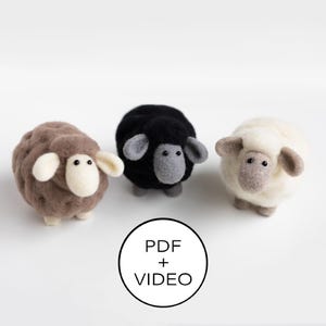 May include: Three handmade felted sheep figurines in brown, black, and white. Each sheep has a round body, small legs, and a detailed face with ears. The image includes a circular graphic with the text "PDF + VIDEO".