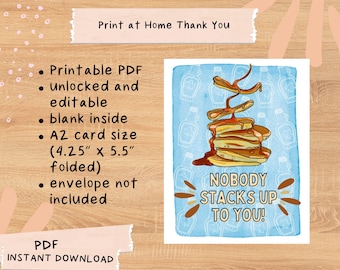 May include: Printable card with a blue background and a stack of pancakes with syrup. The text "NOBODY STACKS UP TO YOU!" is written in brown letters on the card. The card is 4.25 inches by 5.5 inches when folded.