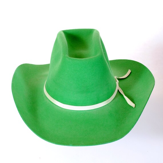 green cowboys hat