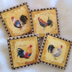 May include: Set of four square coasters featuring colorful illustrations of roosters with their breed names. The coasters have a black and white checkered border.