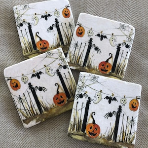 May include: Four square Halloween coasters with a festive design. Each coaster features a white background with a spooky scene of jack-o'-lanterns, ghosts, bats, and spiders. The coasters are perfect for adding a touch of Halloween spirit to any home.