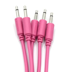 May include: Five pink guitar patch cables with silver connectors. The cables are labelled "SYNTH LAB" and "EVH LINKS".