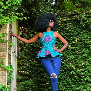 WUNAM turquoise peplum top. image 1