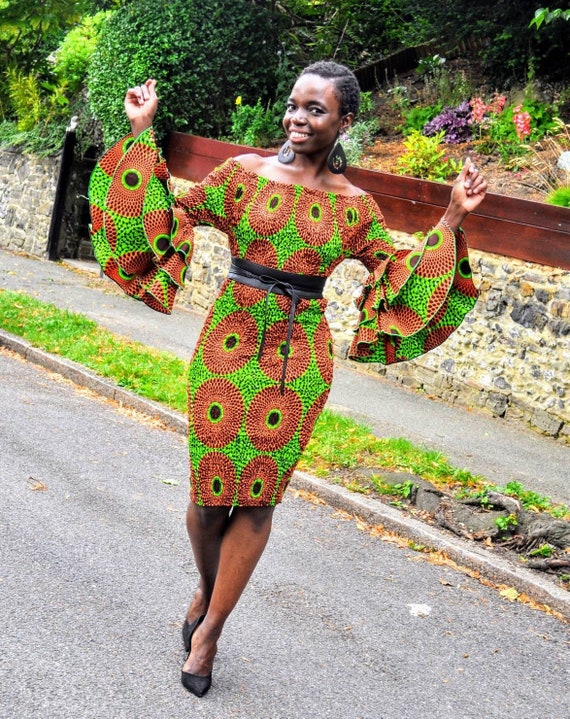 Naliha Women Bodycon Dresses Long Sleeve Slim V Neck Casual African Midi  Dress Orange S at Amazon Women's Clothing store