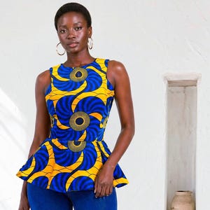 WUNAM peplum top in blue and mustard.