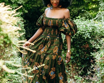JAFFE maxi African print dress in green hues.