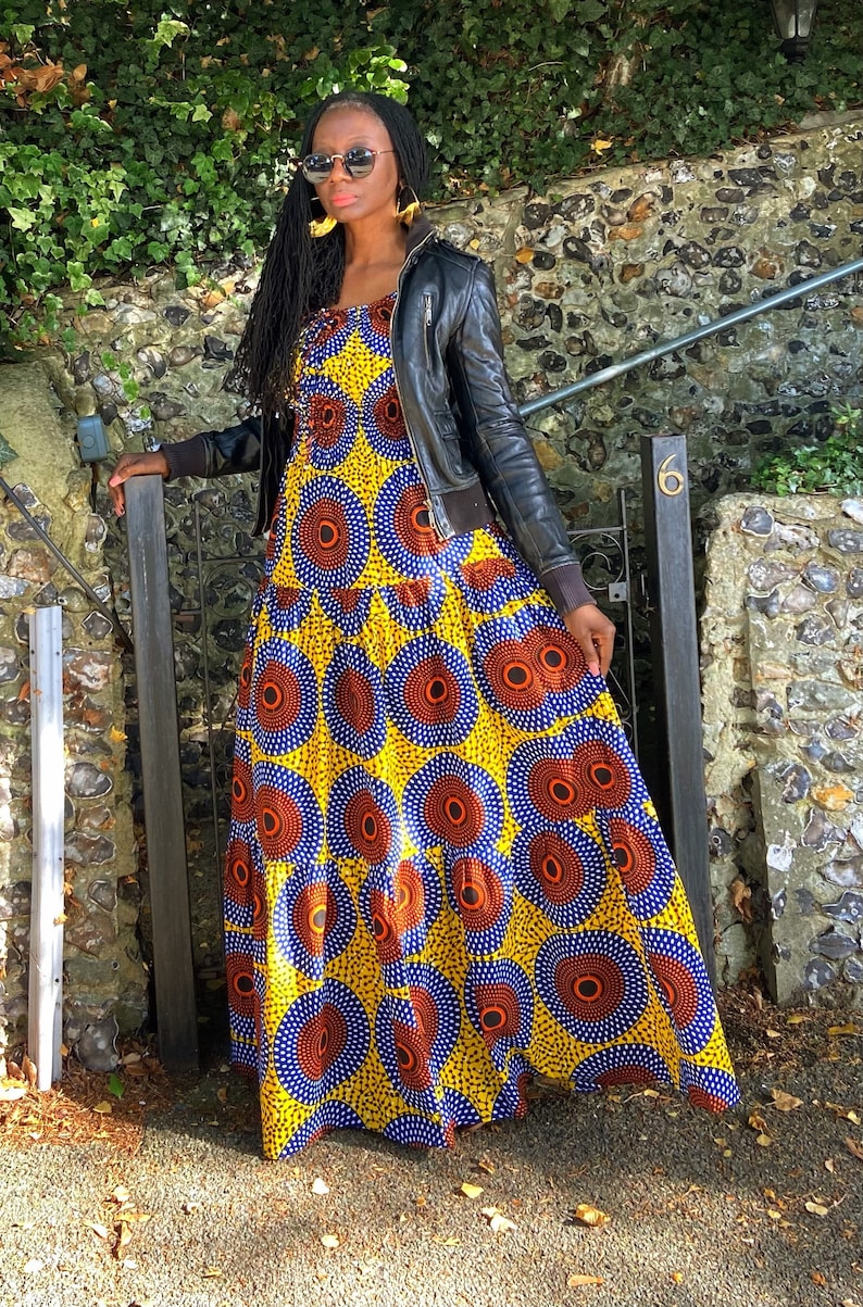 Smocked peasant inspired African print dress.