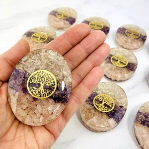 Orgone Energy Palm Stone Amethyst Rose Quartz Crystal Quartz - Tree of Life on hand for size reference.