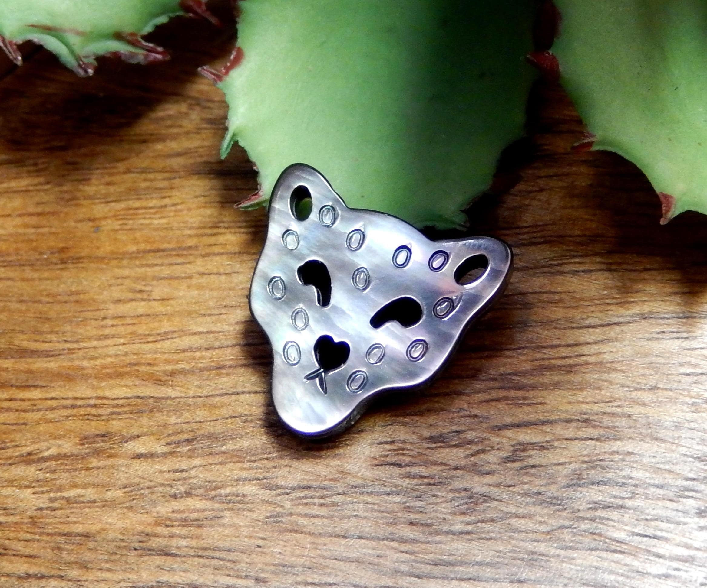 Black Mother of Pearl Leopard Top to Bottom Center Drilled