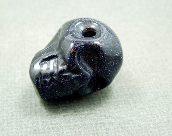 Skull Bead-- Purple Goldstone Skull Bead (11BROWNSHELF-102-04)