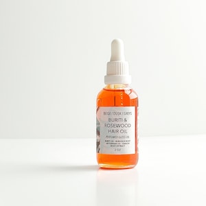 Buriti & Rosewood Hair Oil perfumed gloss oil for hair with buriti oil, daikon extract, argan oil, burdock root, abyssinian oil