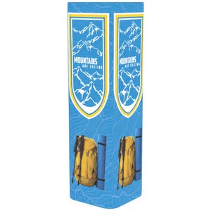 May include: A tall, triangular display stand featuring a light blue background with a topographic line pattern. Each side displays a white shield emblem containing a blue mountain graphic and the text "MOUNTAINS ARE CALLING" above a yellow backpack.