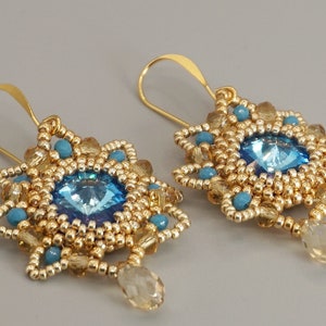 orecchini azzurri e oro pendenti a stella in tessitura di perline con cristallo e goccia immagine 7
