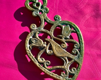 Mid Century Sacred Heart Trivet found by Willabird Designs Vintage Finds. Brass plated iron