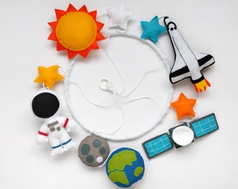 Space baby mobile with an astronaut, Space Shuttle and satellite, handmade from felt