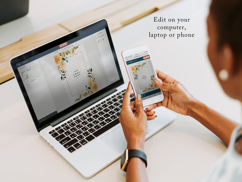 May include: A person is editing a wedding invitation on a laptop and a phone. The invitation features a floral design with yellow and orange flowers and the text "Emma & John".