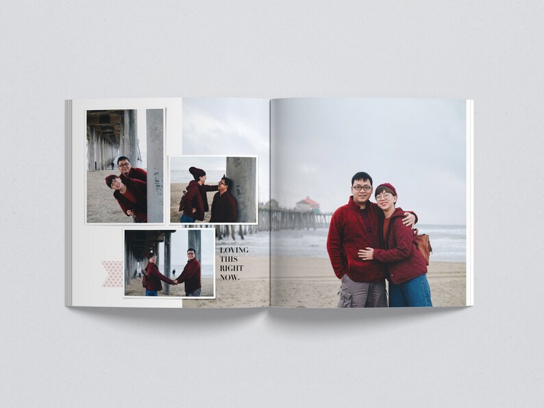 May include: A couple poses for a photo shoot on a beach. The man is wearing a red sweater and the woman is wearing a red jacket. They are standing in front of a pier and the ocean is in the background. The text "Loving this right now." is written on the page.