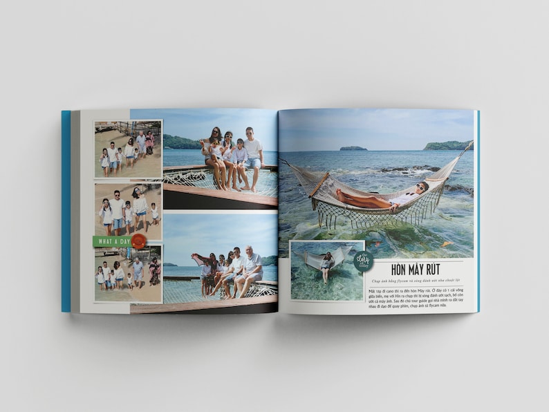 May include: A photo album with images of a family on a tropical vacation. The album features photos of the family on a boat, in a hammock, and on a beach. The album has a blue and white cover with the text "What a Day!" and "Hon May Rut" on the pages.