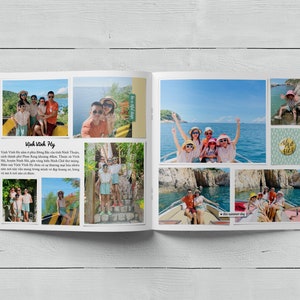 May include: A photo album with a collage of photos of a family on a boat trip. The photos are arranged in a grid pattern and show the family enjoying their time together. The album has a white cover and is open to reveal the photos.