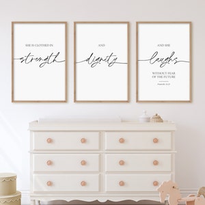 She is Clothed in Strength And Dignity Girls Room Decor, Nursery Bible Verse Wall Art, Proverbs 31:25, Scripture Signs, Women Gifts Posters