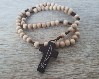 Rosary made of wooden beads with a wooden cross made of dark-stained beech for First Communion