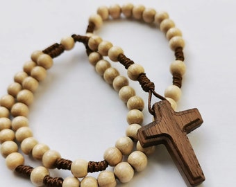 Rosary made of wooden beads with a wooden cross made of walnut wood for First Communion