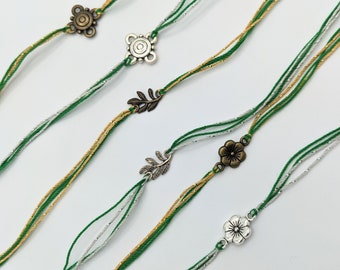 Green Silver Gold Charm Rakhis | Flower Rakhi, Rakhi With Leaves Charm, Green Thread Rakhi