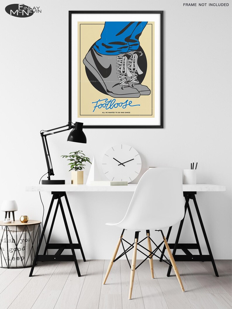 May include: A retro-style poster for the movie Footloose, featuring a pair of grey sneakers with blue laces and a blue jean leg. The text "Footloose" is written in blue cursive script with the tagline "All he wanted to do was dance".