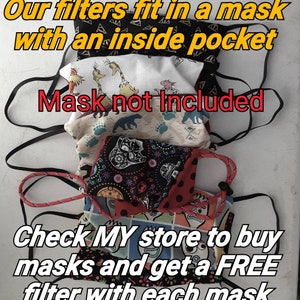 May include: A stack of patterned face masks with black elastic straps. The masks feature various designs, including bears, skulls, and cartoon characters. Text on the image reads: "Our filters fit in a mask with an inside pocket. Mask not included. Check MY store to buy masks and get a FREE filter with each mask."