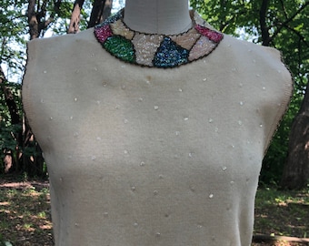 1960s cream angora wool sleeveless fitted sweater with geometric beaded trim and sequins