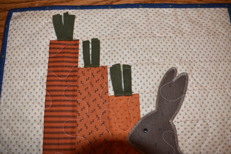 Primitive Bunny and Carrots on this Wall Warmer measuring about 18 x 18