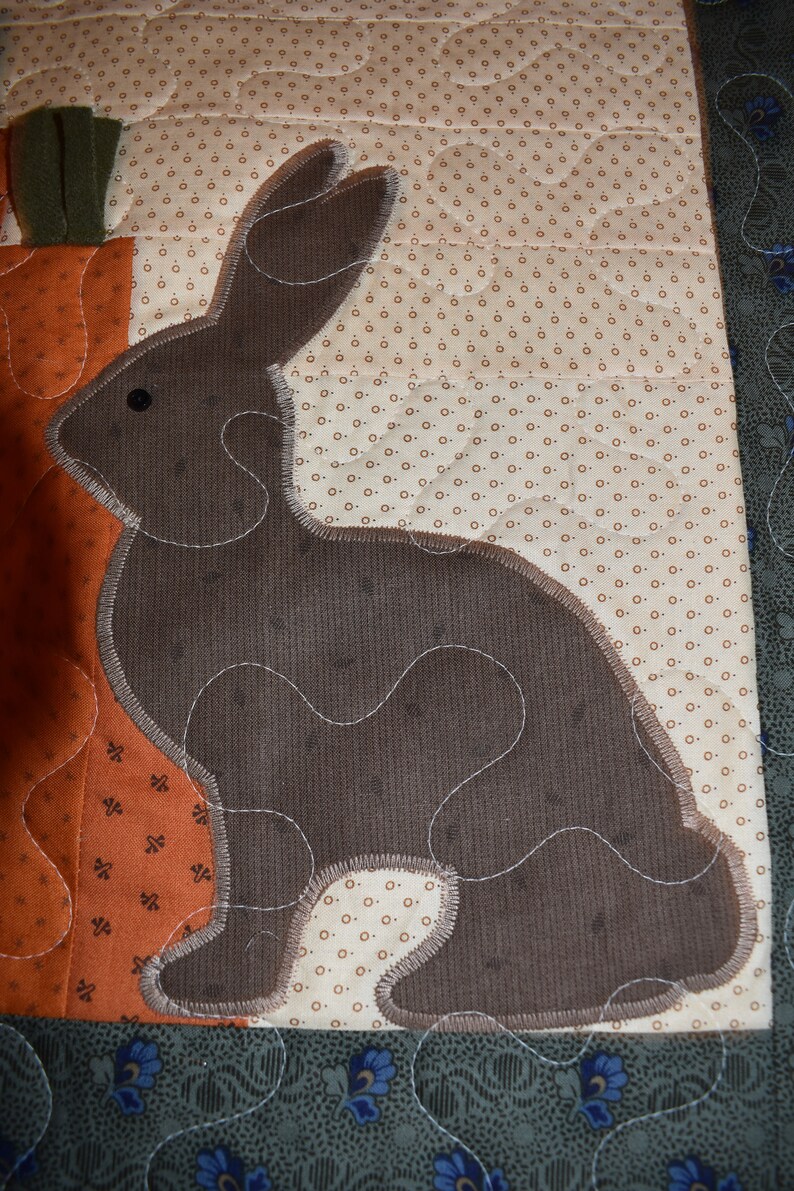 Primitive Bunny and Carrots on this Wall Warmer measuring about 18 x 18