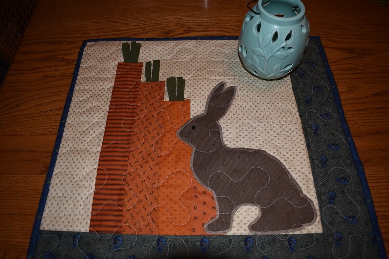 Primitive Bunny and Carrots on this Wall Warmer measuring about 18 x 18