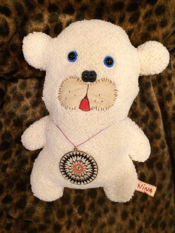 teddy bear with blue eyes