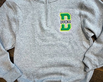 Sudadera con cremallera de un cuarto y aplique de mascota del equipo/escuela para niños