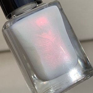 Winters Hot Flash white nail polish flash of red image 1