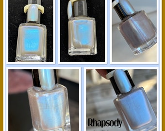 Rhapsody in Blue.. a beige grey with blue flash polish