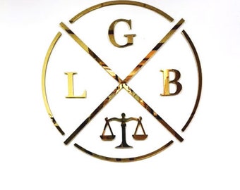 May include: A gold-colored logo with the letters "G", "L", and "B" arranged in a circle. A scale of justice is in the center of the circle.