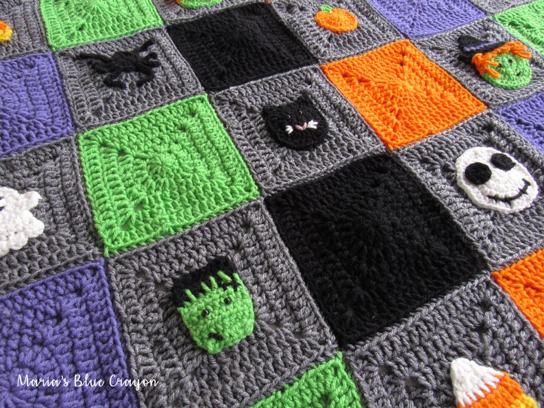 May include: A crocheted Halloween blanket with squares featuring various Halloween characters, including a ghost, a spider, a black cat, a pumpkin, a witch, a Frankenstein, a candy corn, and a Jack Skellington. The blanket is made with different colored yarn, including gray, green, orange, purple, black, and white.
