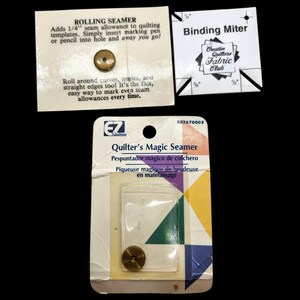 May include: Image of quilting tools, including a "Rolling Seamer" with instructions, a "Binding Miter" guide, and a "Quilter's Magic Seamer" in its packaging. The tools are designed to assist with precise seam allowances and binding in quilting projects.