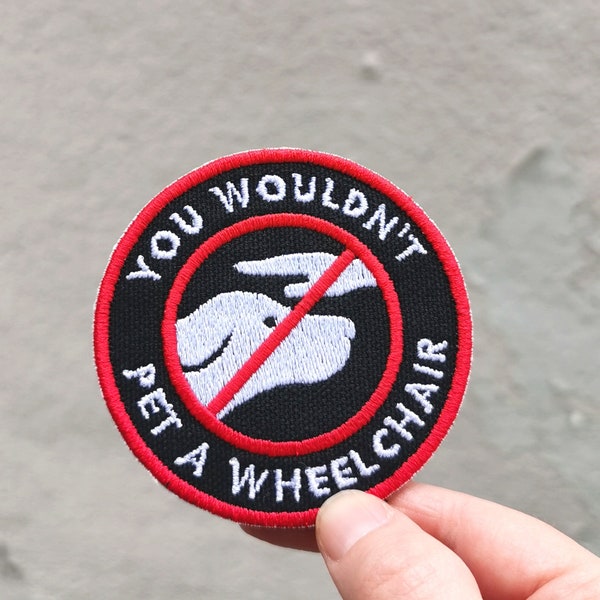 You wouldn't pet a wheelchair patch for working dog gear