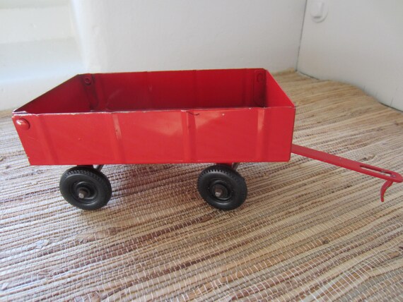 red metal wagon