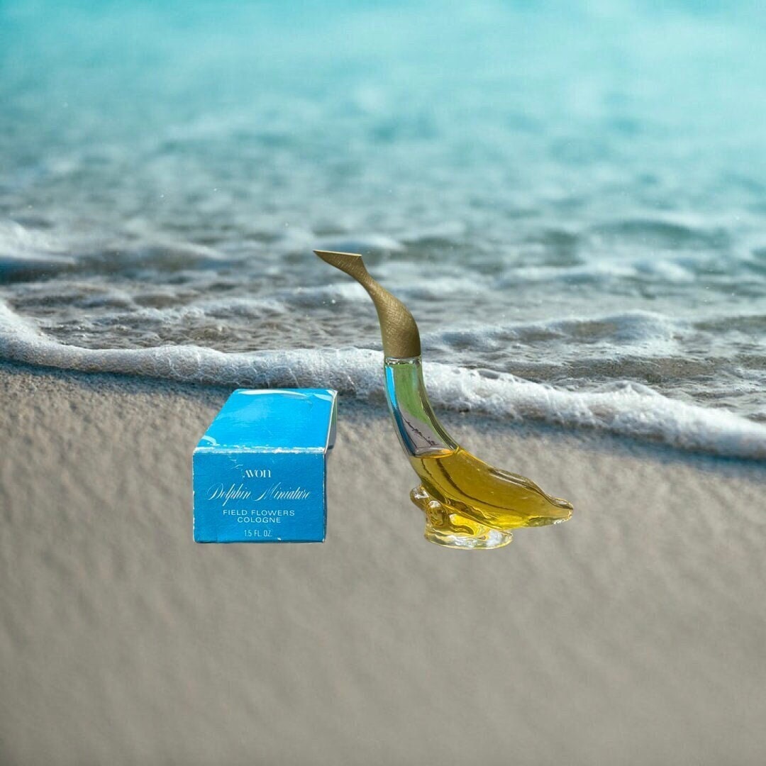 Avon Dolphin Miniature Cologne Bottle. Still Contains the Original Field of Flowers Cologne